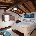 펜션 Sa Domedda